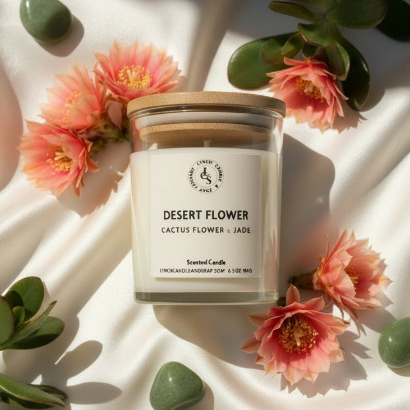 Candle labeled 'Desert Flower' on a patterned fabric background