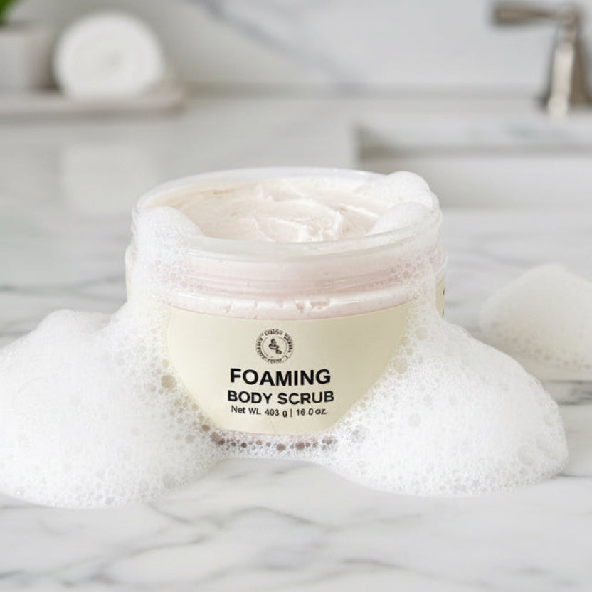 Jar of foaming body scrub on a gray marble counter tip
