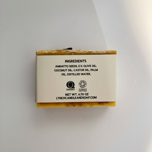 Bar of soap with a label on a white background