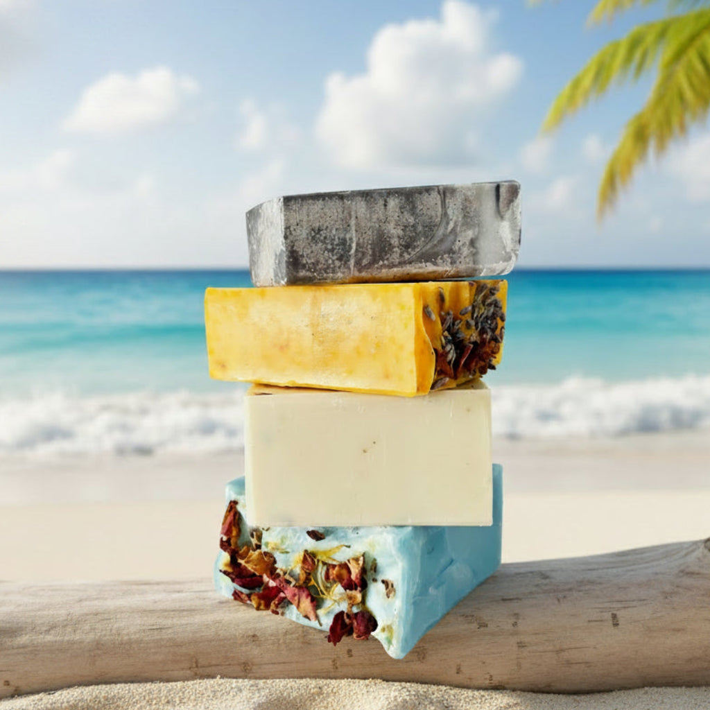 Stack of three handmade soap bars with natural ingredients on a white background