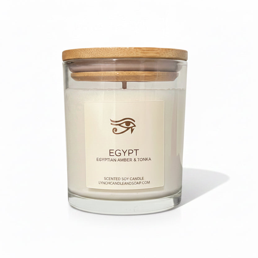 Candle with wooden lid labeled 'Egypt' on a white background